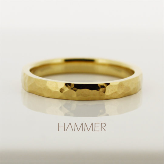 ハンマーでつけたれた模様のAU999(k24)純金の指輪の画像